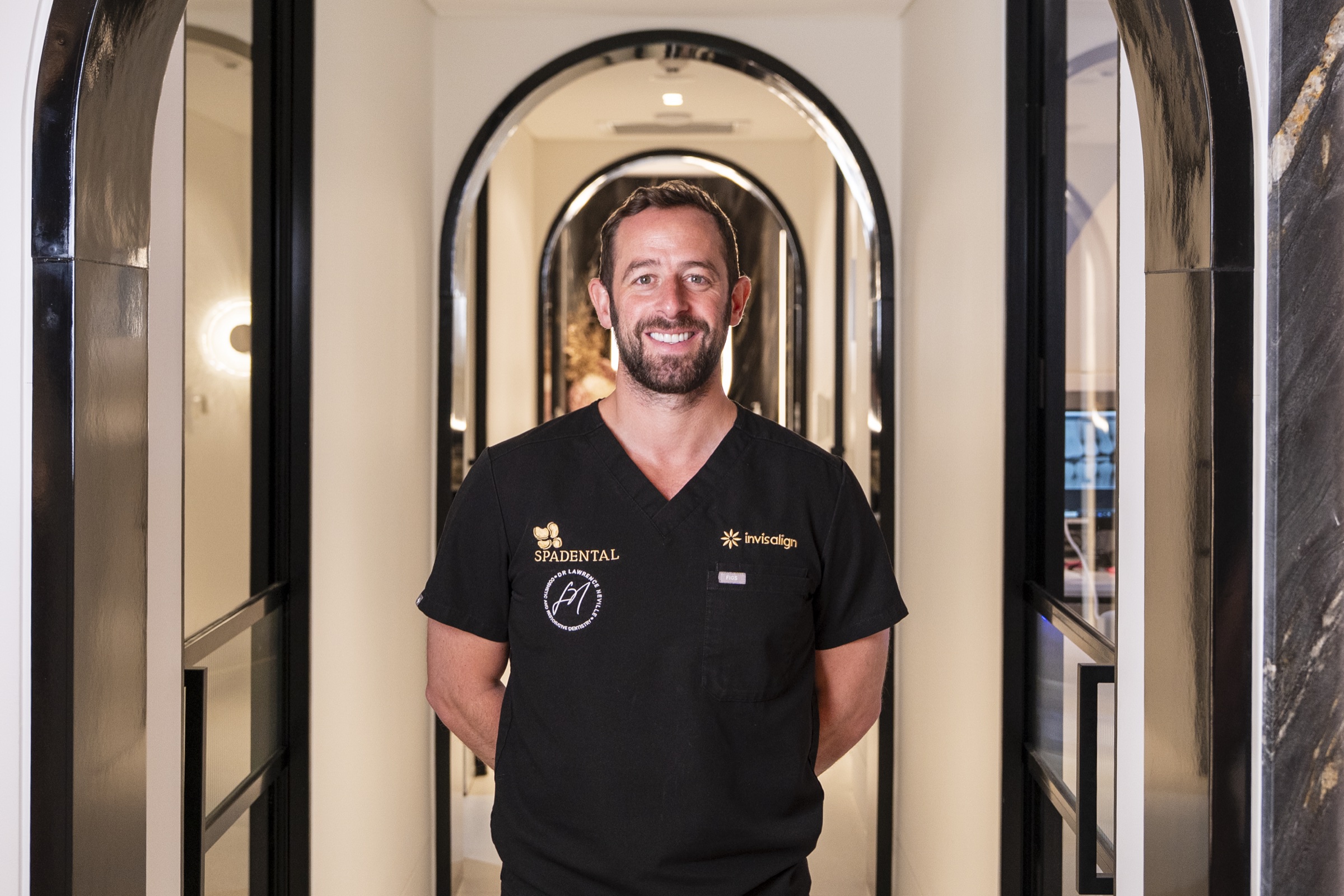 Dr Lawrence Neville at the entrance to Spa Dental Sydney CBD
