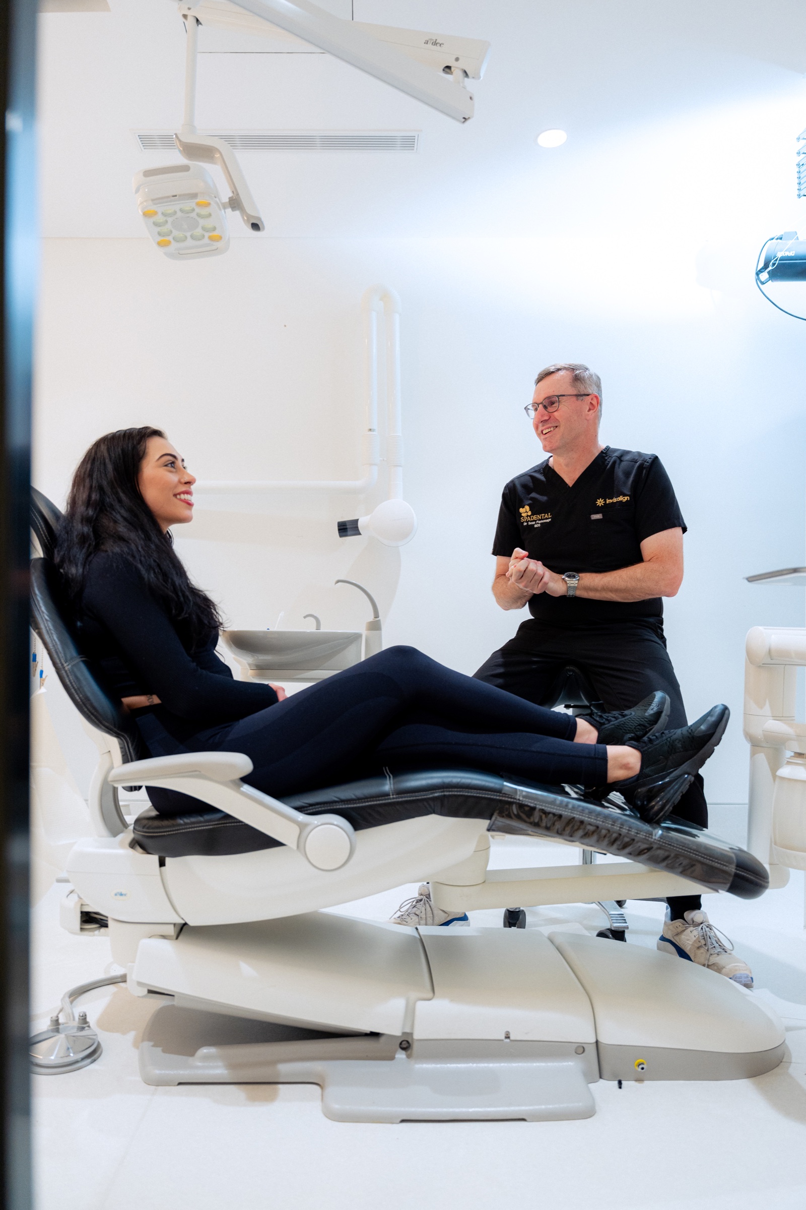 An oral health therapist performing a clean at Spa Dental